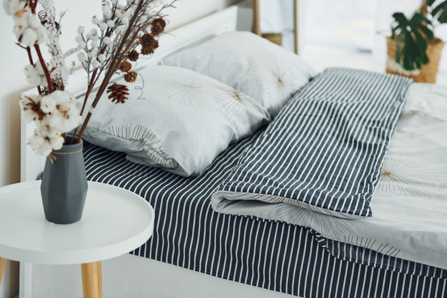 bed with striped sheets